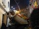 Roma, camion rifiuti si schianta contro muro palazzina: gravi autista e un'inquilina